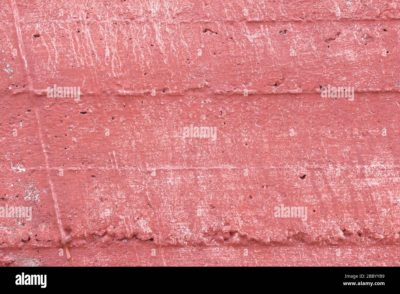 Red grunge wall background. Froly colored texture. Stock Photo