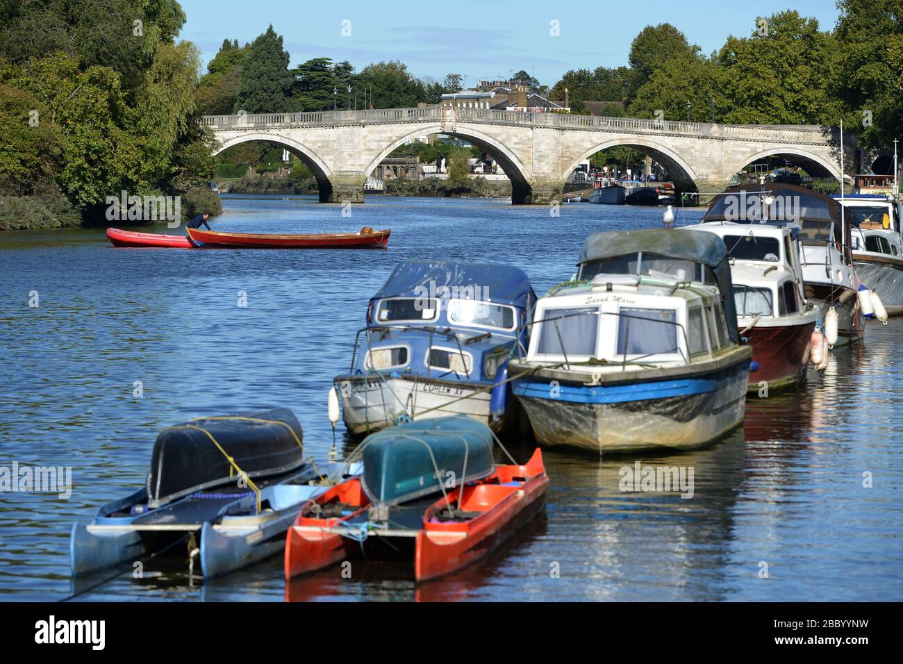 Boats on the Thames by Richmond Bridge, Richmond, London, UK Stock Photo