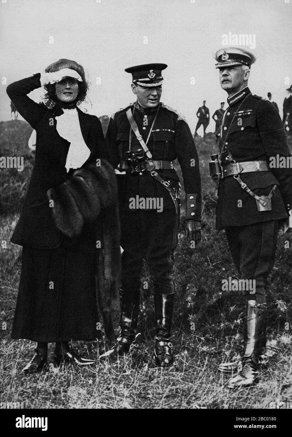 Winston Churchill with his wife, Clementine and General Bruce Hamilton at army manoeuvres near Aldershot, Hampshire.1910. Stock Photo