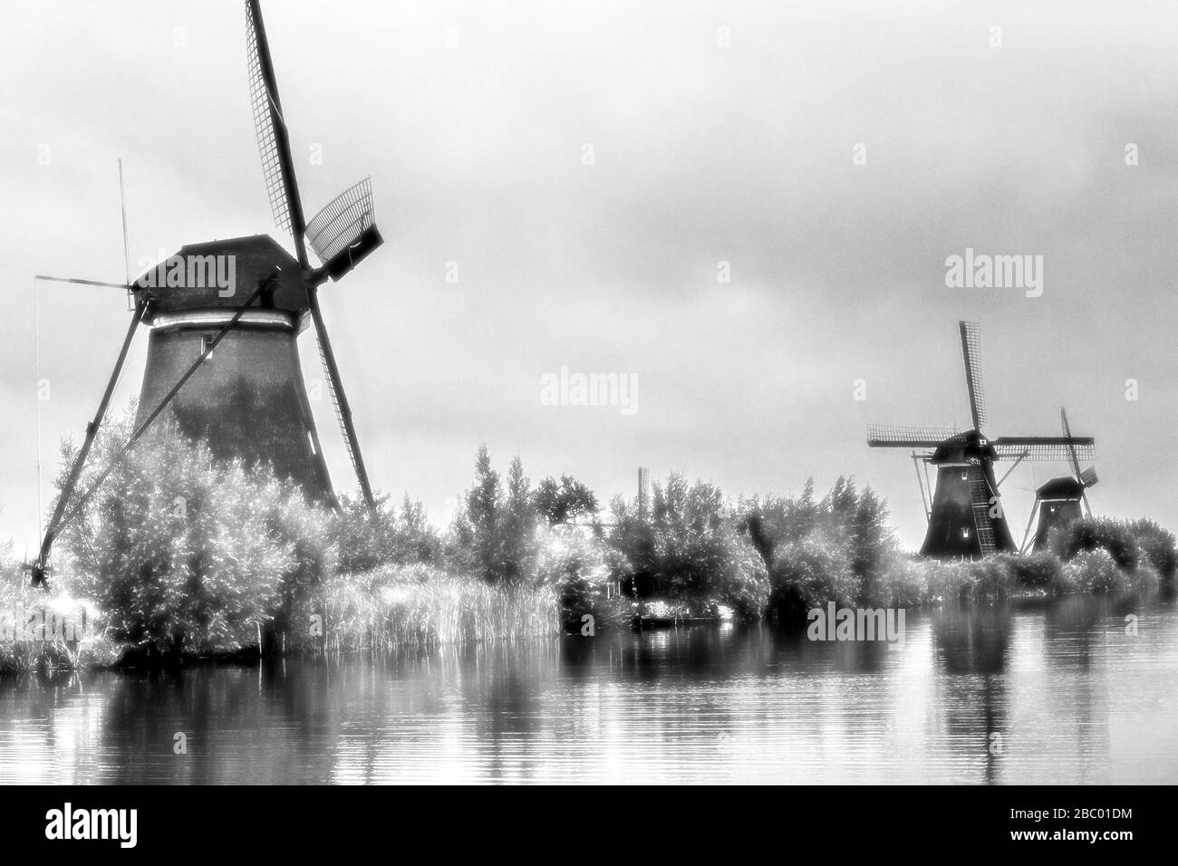 Overwaard windmills Nos 2, 3 and 4, Kinderdijk, UNESCO World Heritage Site, South Holland, Netherlands.  Black and white Infra-red effect Stock Photo