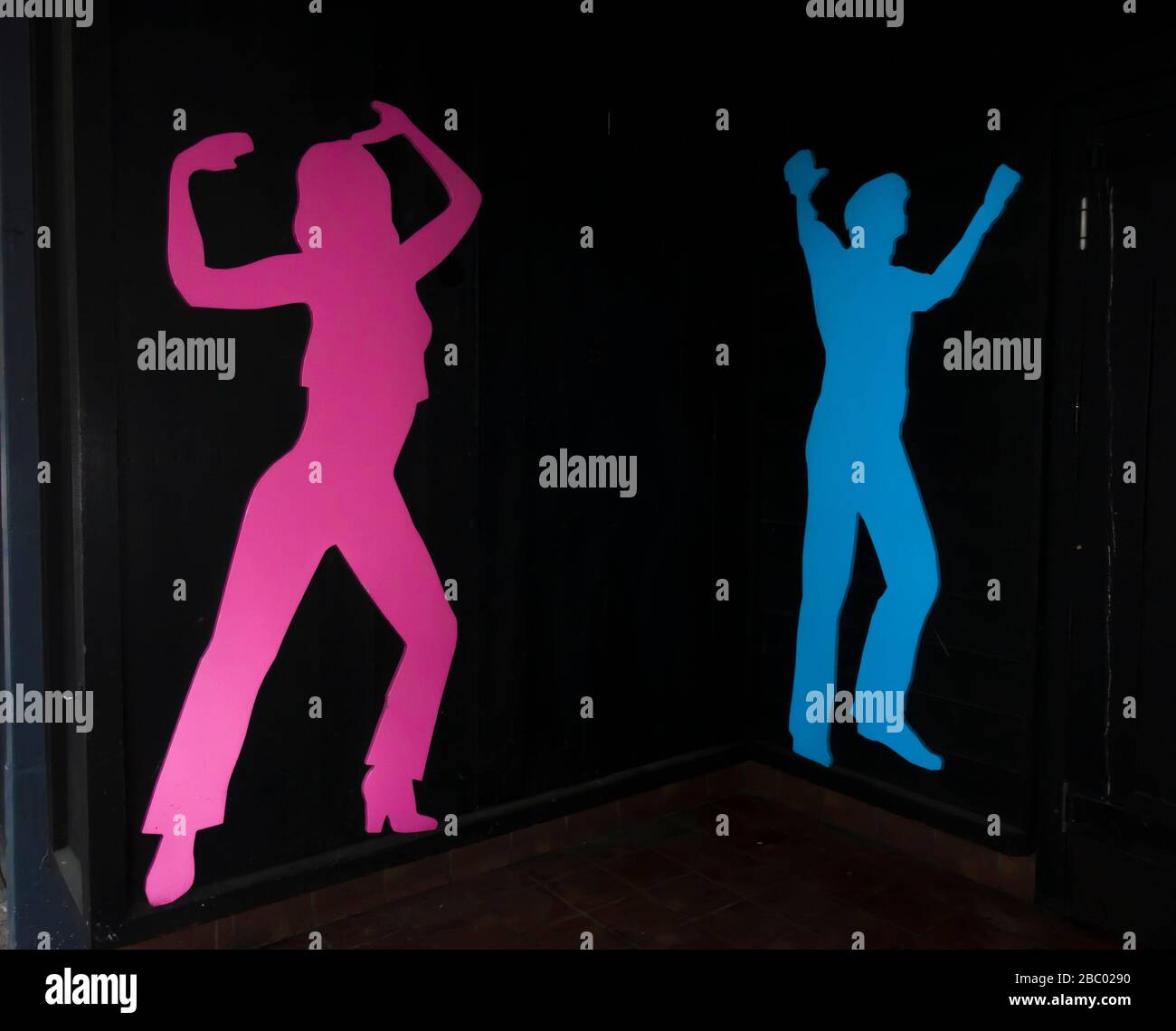 Male and female coloured cutouts in entrance to Shack nightclub Lincoln 2019 Stock Photo