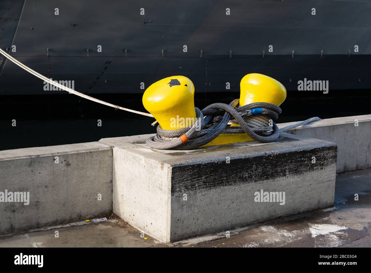Mooring bollard entwined with a mooring rope at the port of San Diego