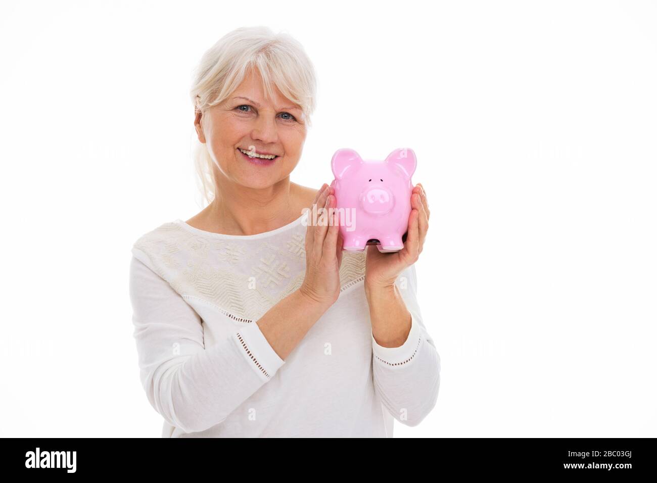 Mature woman smiling money hi-res stock photography and images - Alamy