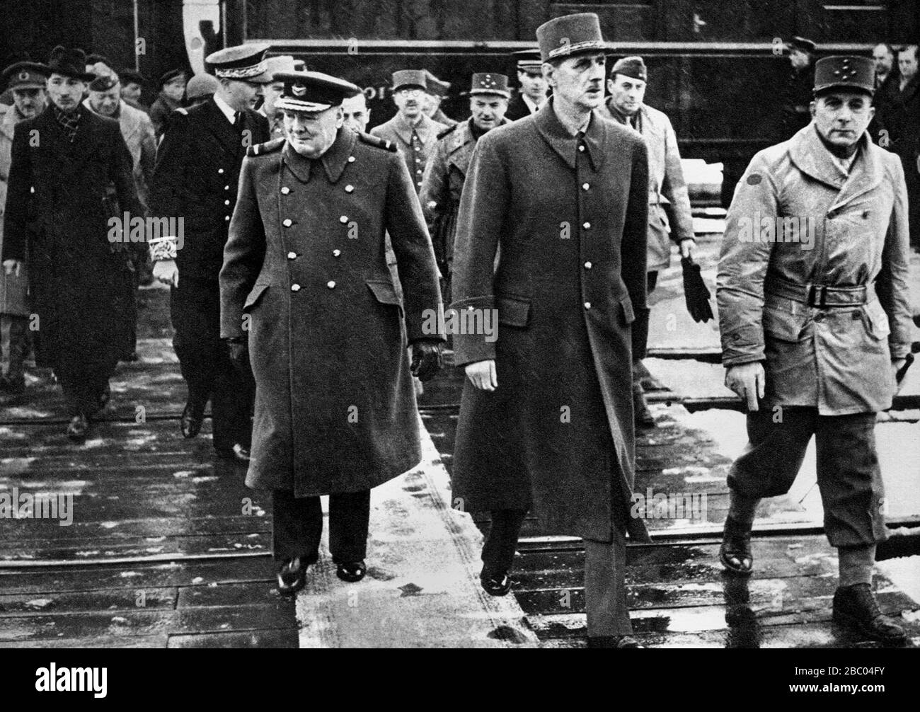 Winston Churchill inspecting units of the French army at Besancon with de Gaulle and General de Lattre de Tassigny. 3oth November 1944. Stock Photo