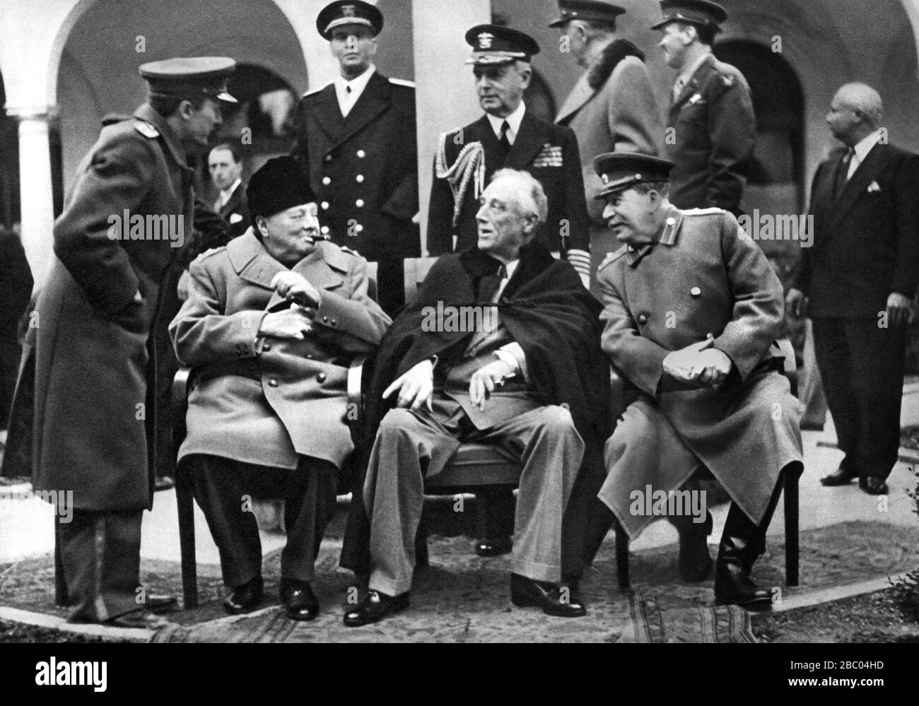 Winston Churchill with President Roosevelt and the Soviet Leader, Joseph Stalin outside the Livadia Palace at the Yalta Conference, Crimea. Feb. 1945. Stock Photo