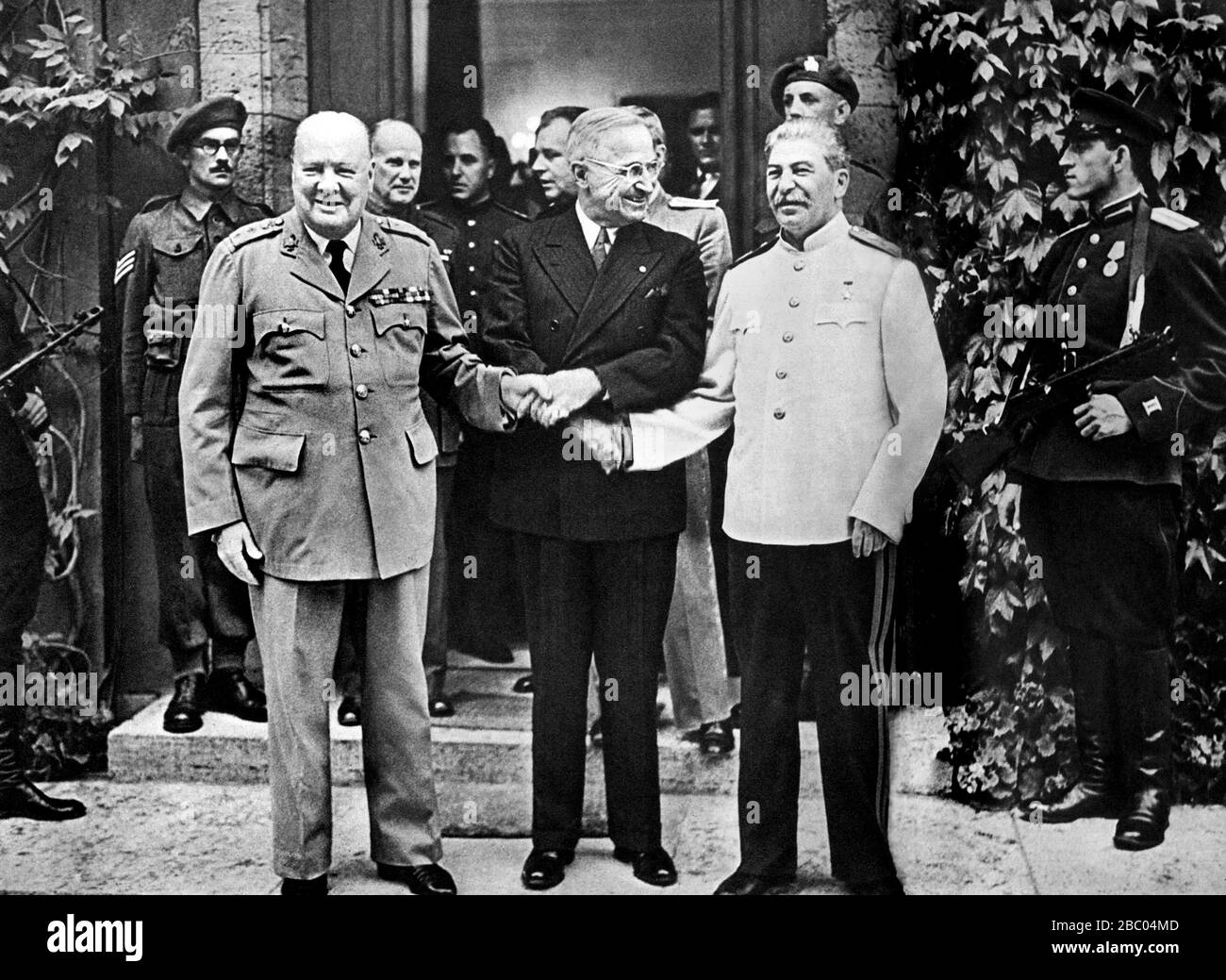 Winston Churchill with President Truman and Marshal Stalin at the Potsdam Conference, Berlin. July 1945 Stock Photo
