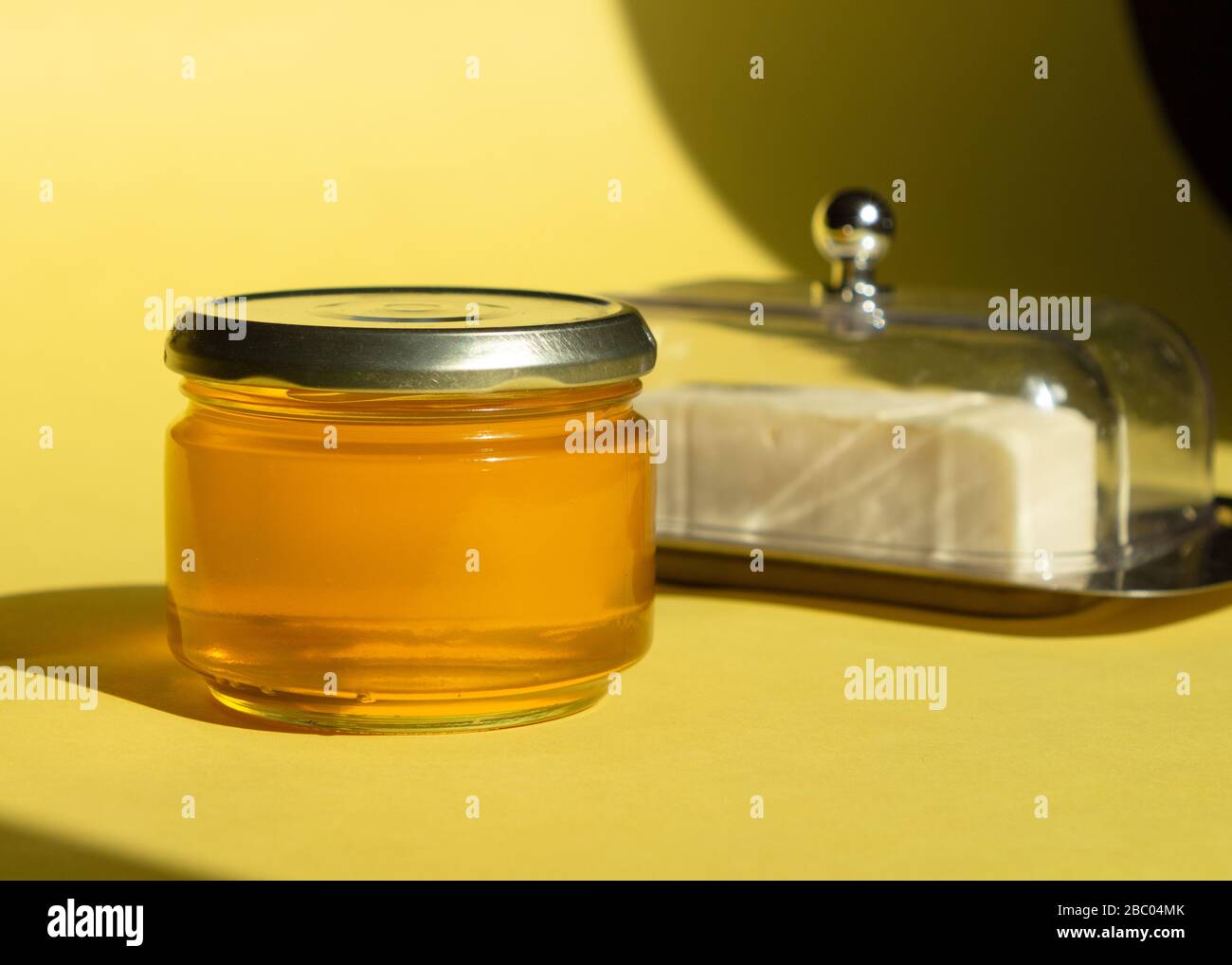 Ghee or clarified butter in jar. Healthy eating and using organic fresh