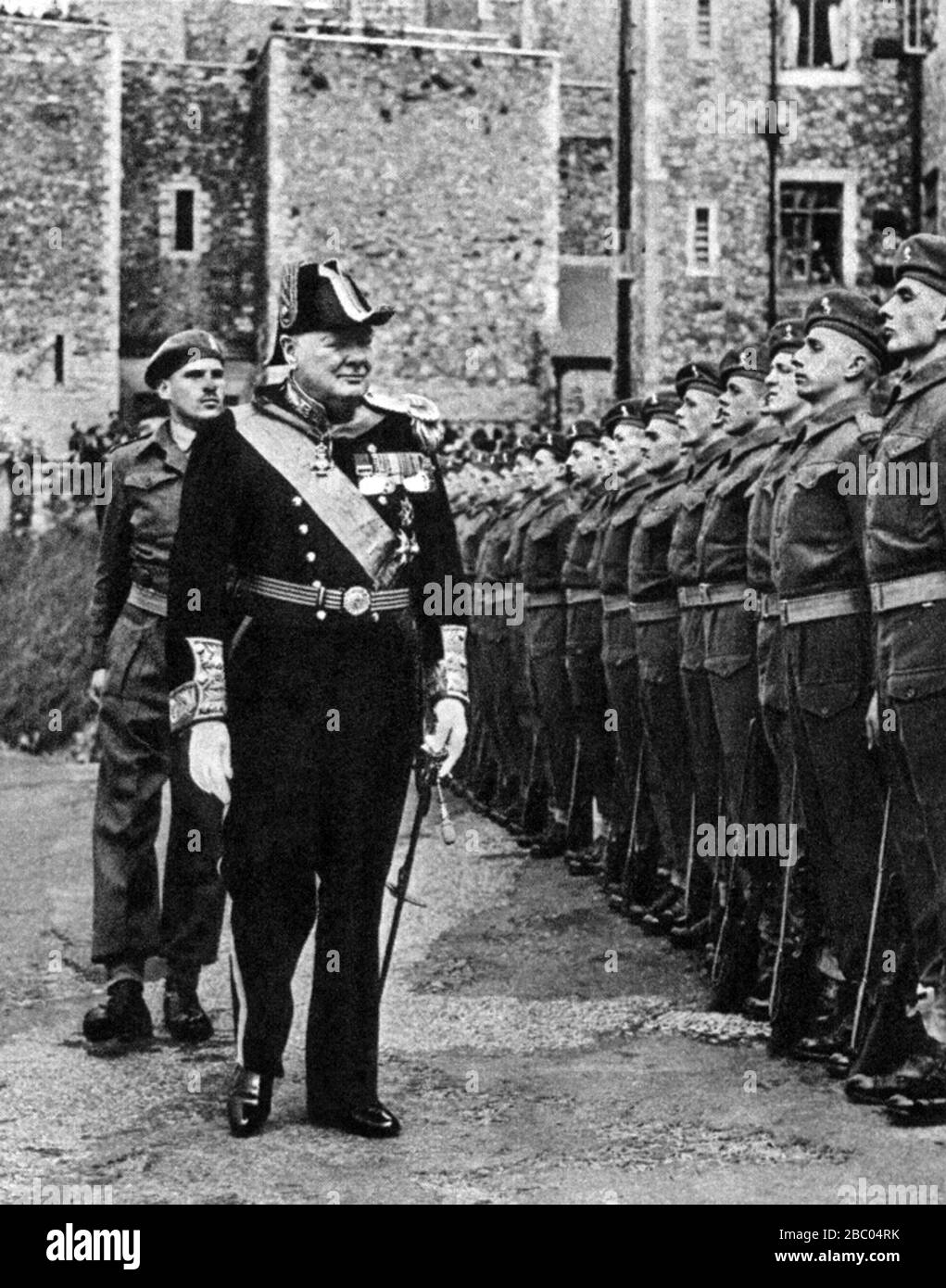 Winston Churchill as 'Lord Warden of the Cinque Ports' inspects the Guard of Honour at Dover Castle. 14th August 1946 Stock Photo