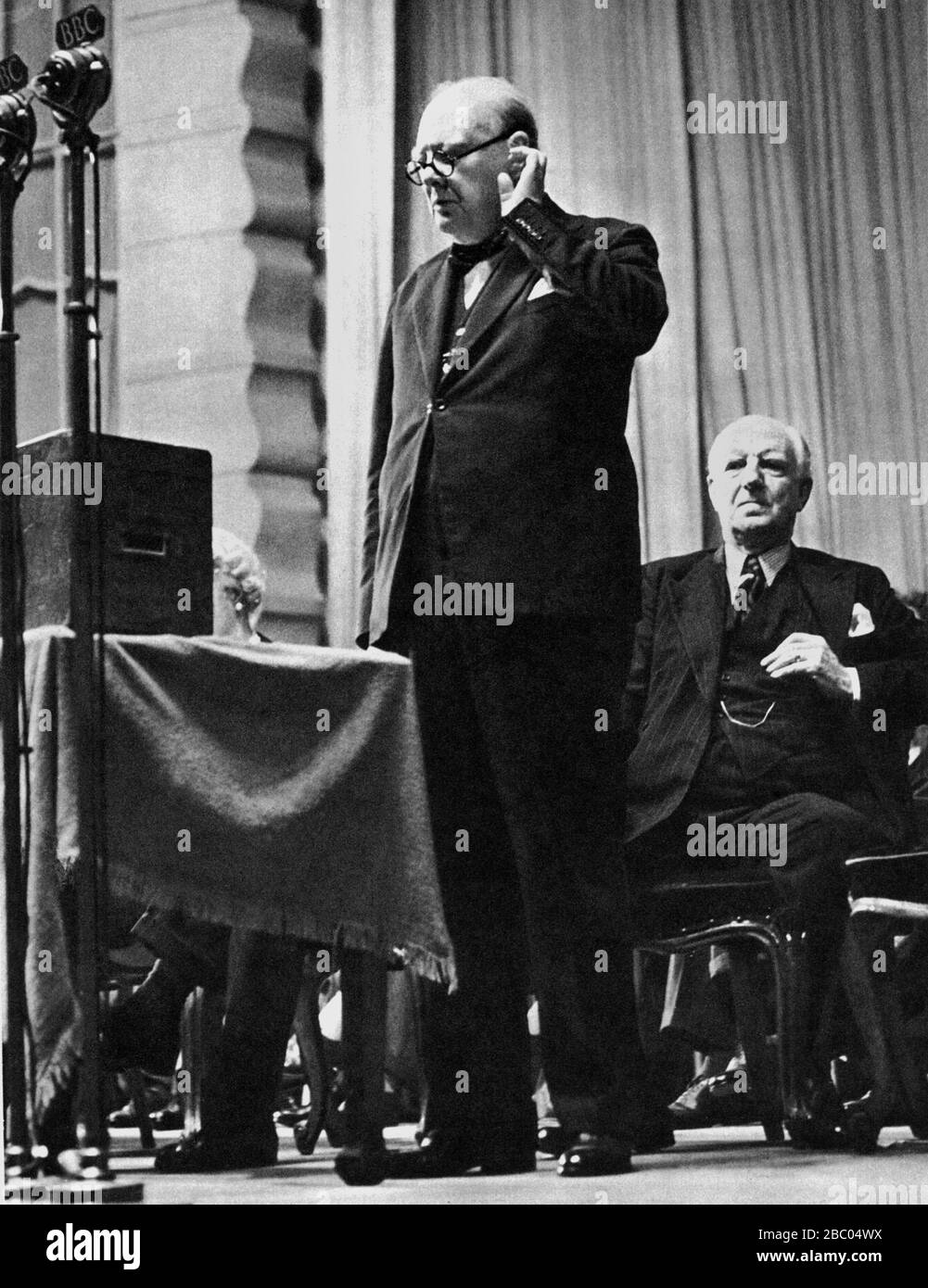 Winston Churchill speaking at the Dome in Brighton. With him: Lord Woolton. 4th October 1947. Stock Photo