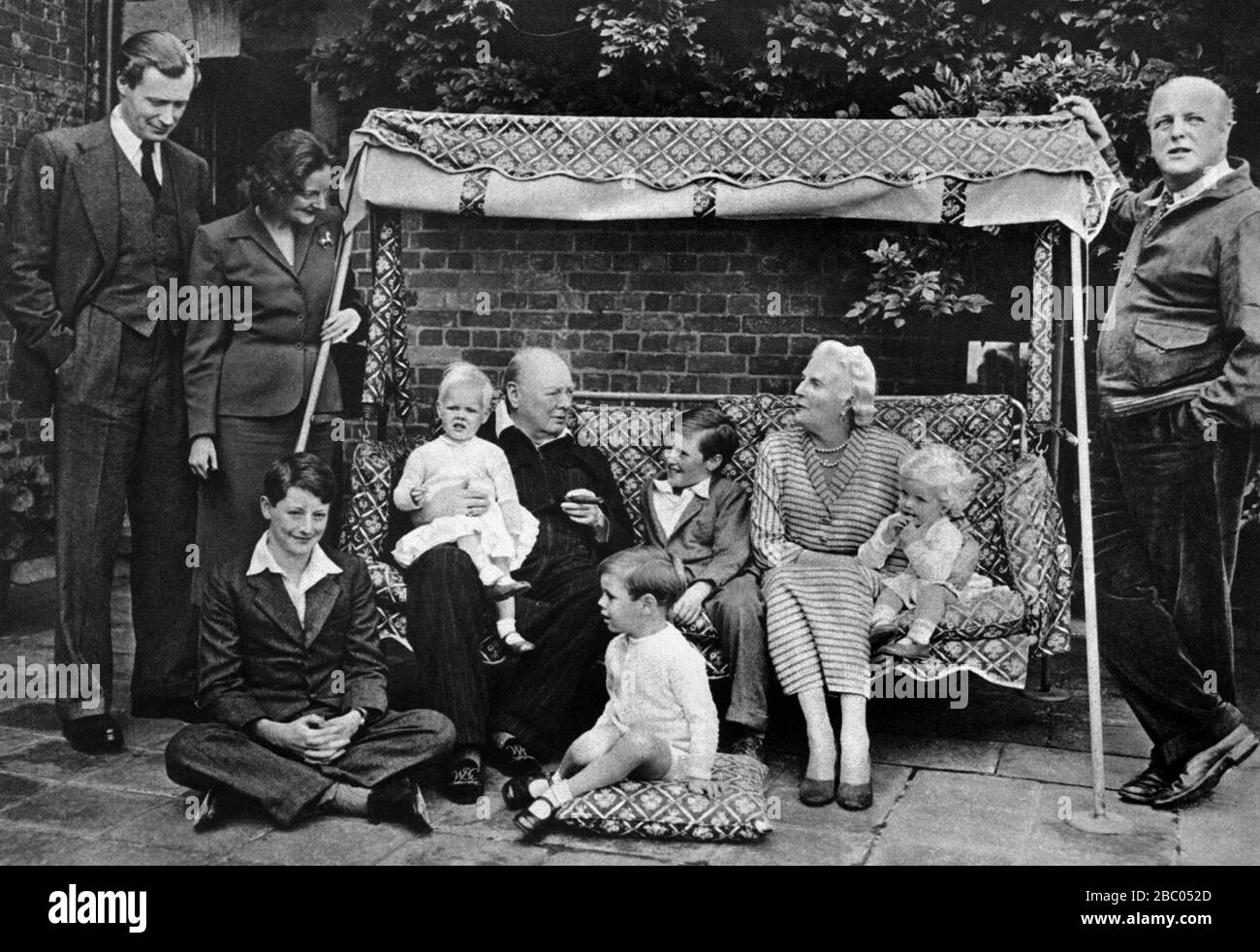 Churchill family at Chartwell. L-R, Duncan Sandys and wife, Julian Sandys, Emma & Nicholas Soames, Winston and Arabella Churchill and Randolph. 1951 Stock Photo