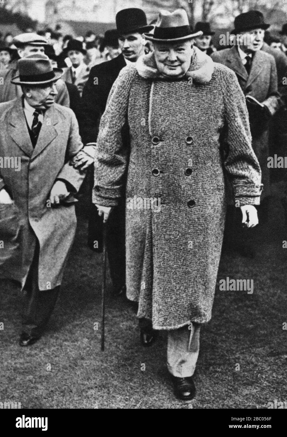 Winston Churchill visiting Sandown Park Racecourse where his horse 'Non Stop was running.13th March 1953 Stock Photo