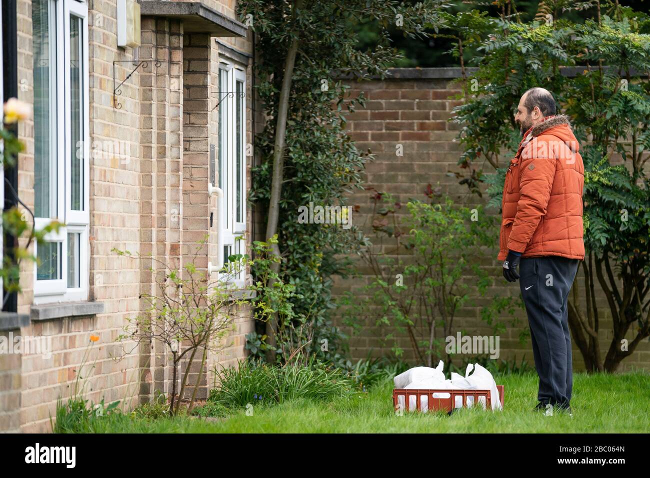 Tony Rosa delivers food packages from Enfield Council to the vulnerable in Enfield, north London. Stock Photo