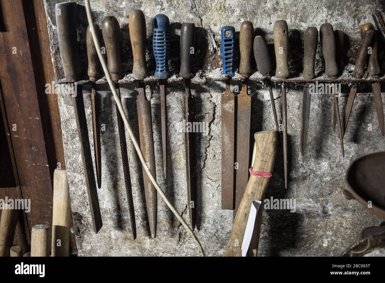 Various files hang in the smithy of the Hachlschmith in Josefsthal at Schliersee. The hammer smithy has existed for over 300 years and supplies not only regional woodworkers and forest farmers but also a large construction company with tools. [automated translation] Stock Photo