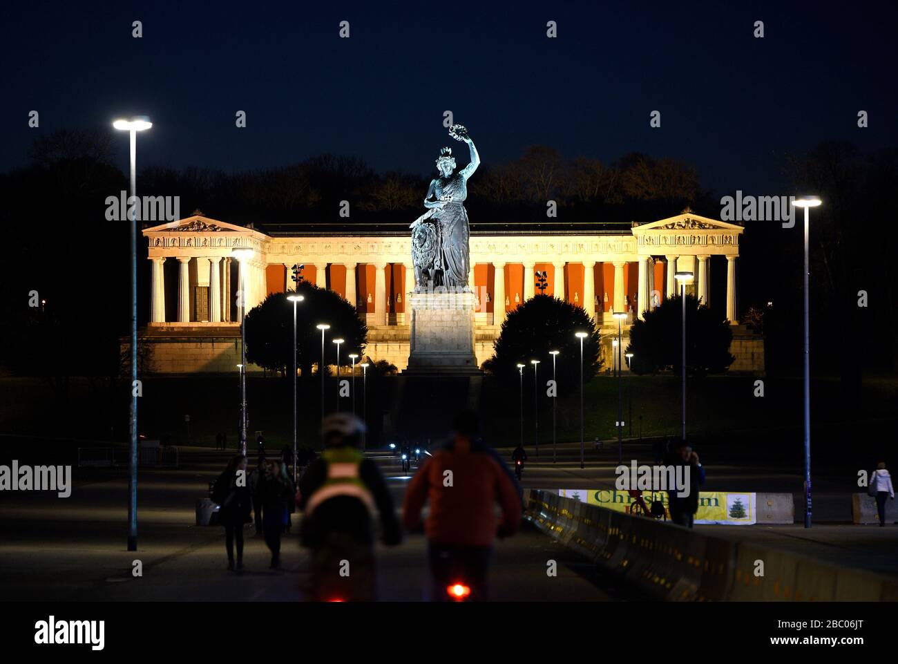 Illuminated Bavaria statue at night in Munich. [automated translation] Stock Photo