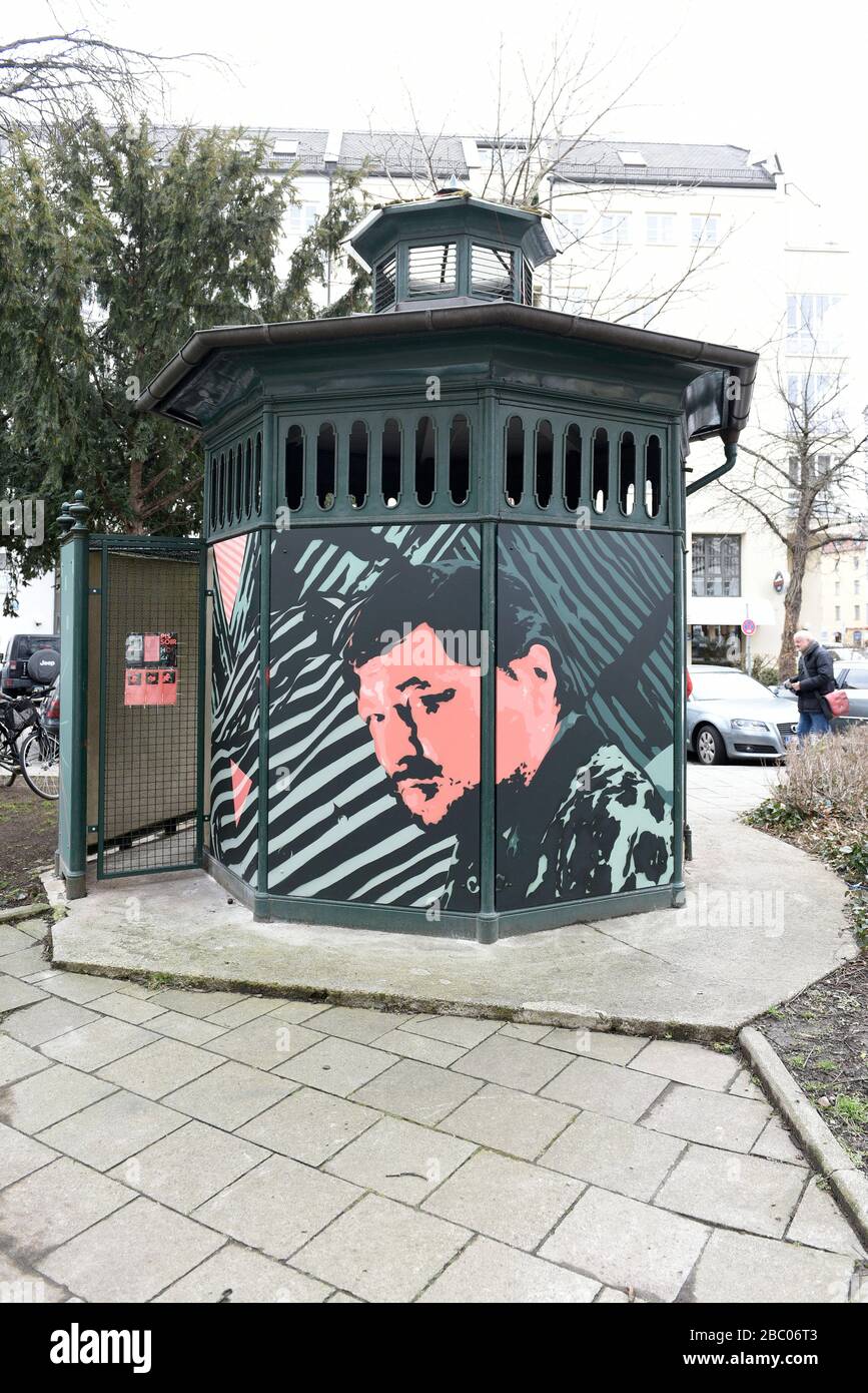 The initiative 'The Urinal' by author and publisher Martin Arz and innkeeper Thomas Zufall, together with the artists of the group 'Graphism', has designed the outer walls of the disused, historical urinal at the Holzplatz in the Glockenbachviertel with motifs by the prominent Munich residents Freddie Mercury, Rainer Werner Fassbinder (in the picture) and Albert Einstein. [automated translation] Stock Photo