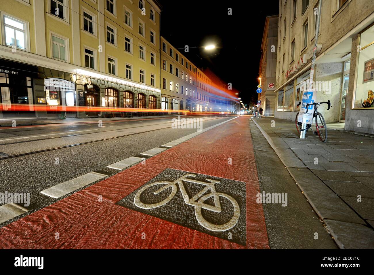 In Fraunhoferstraße in Munich's Isarvorstadt, the parking spaces at the roadside have each been replaced by a cycle path. [automated translation] Stock Photo