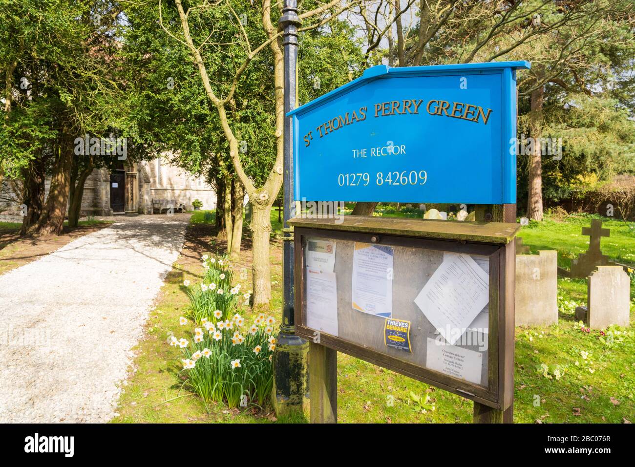 Blue sign and noticeboard located at the entrance of St Thomas' Church, Perry Green, Much Hadham, Hertfordshire. UK Stock Photo