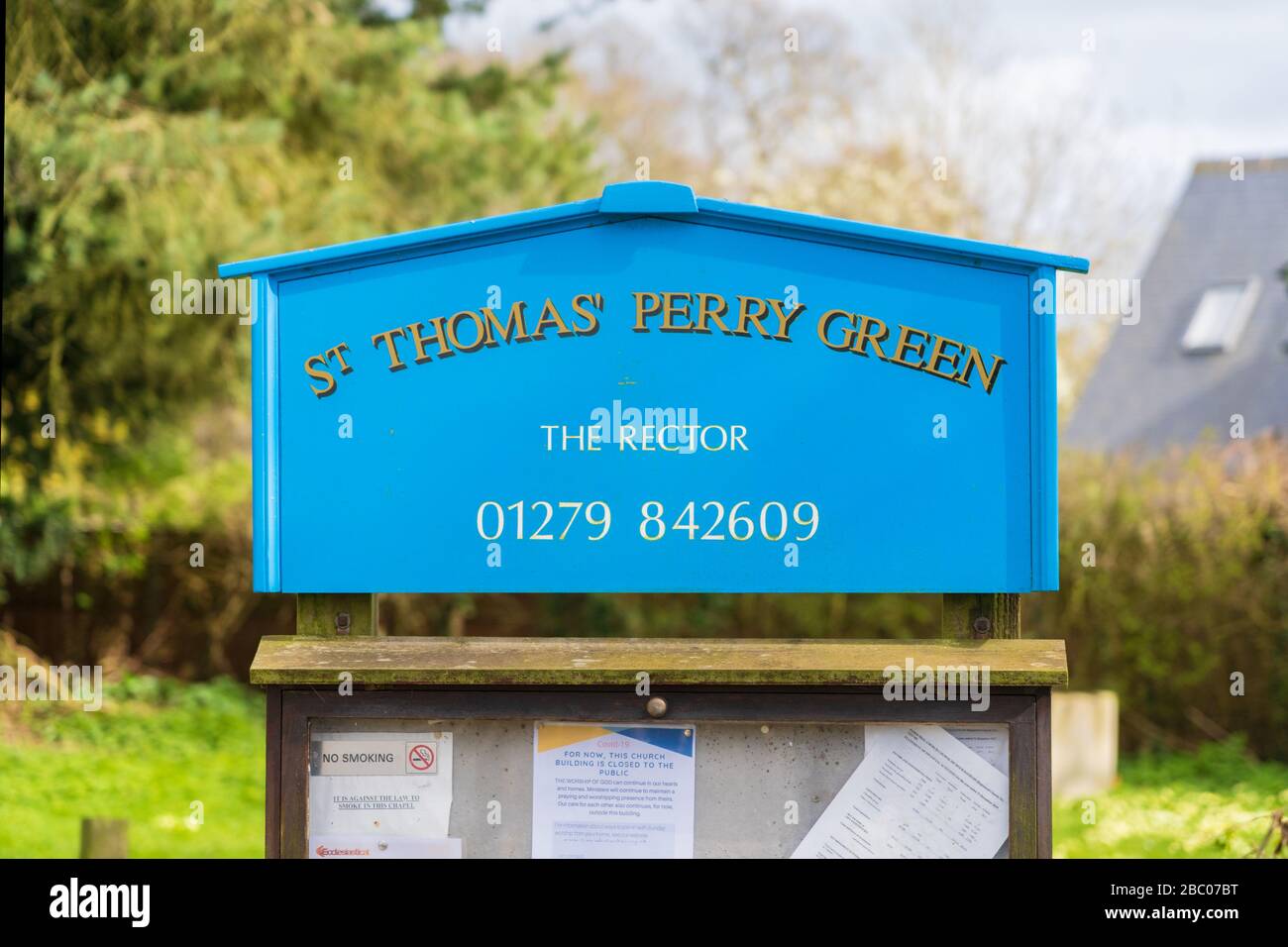Blue sign and noticeboard located at the entrance of St Thomas' Church, Perry Green, Much Hadham, Hertfordshire. UK Stock Photo