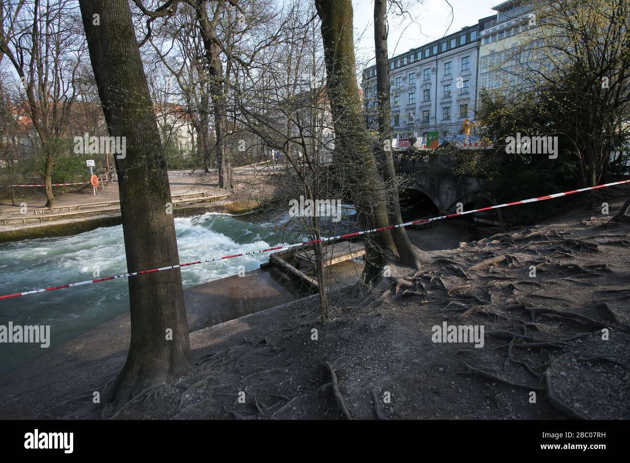 The Eisbach wave on Prinzregentenstrasse in the English Garden is closed due to the rampant corona virus. [automated translation] Stock Photo