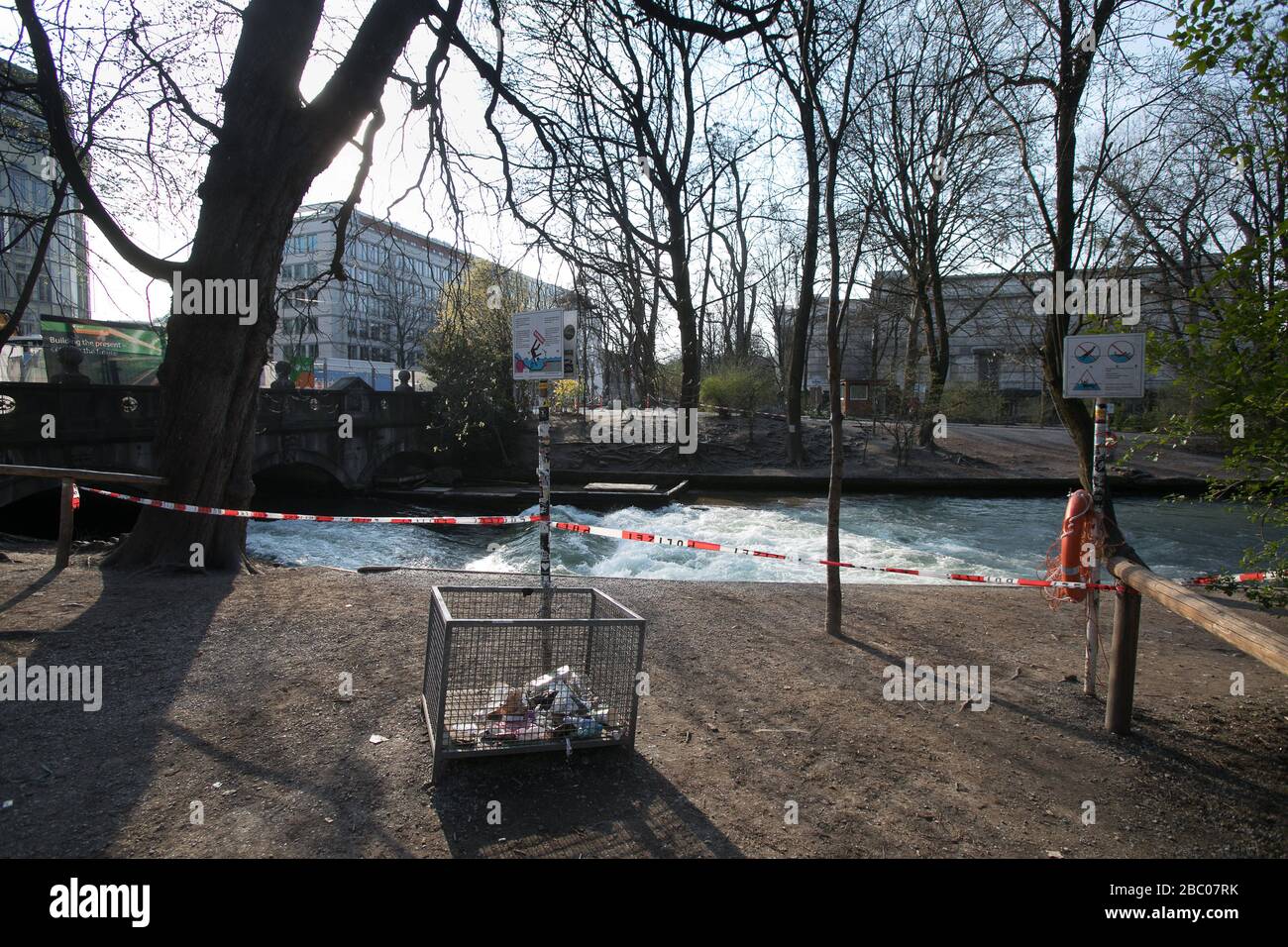 The Eisbach wave on Prinzregentenstrasse in the English Garden is closed due to the rampant corona virus. [automated translation] Stock Photo