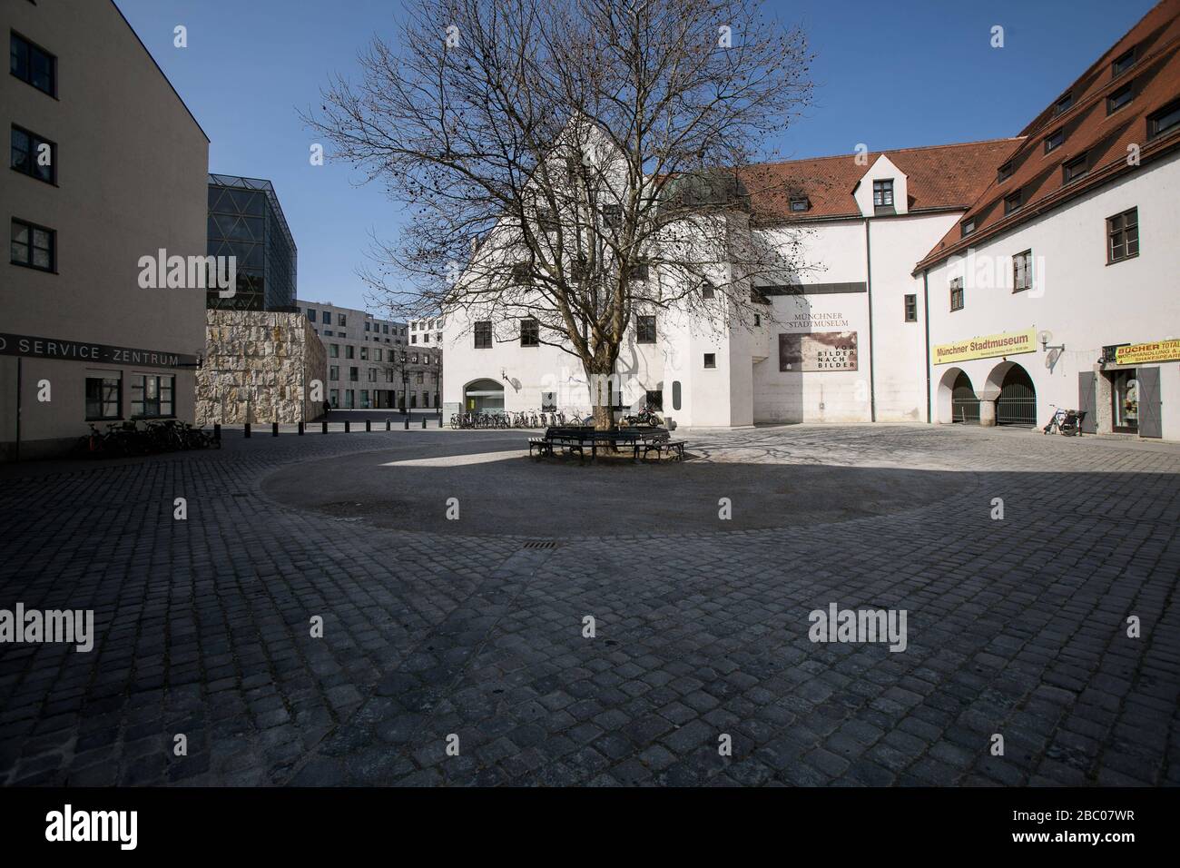 Due to the restrictions in public life in the face of the Corona pandemic, Munich's streets and squares are almost deserted. The picture shows Sebastiansplatz with the city museum. [automated translation] Stock Photo