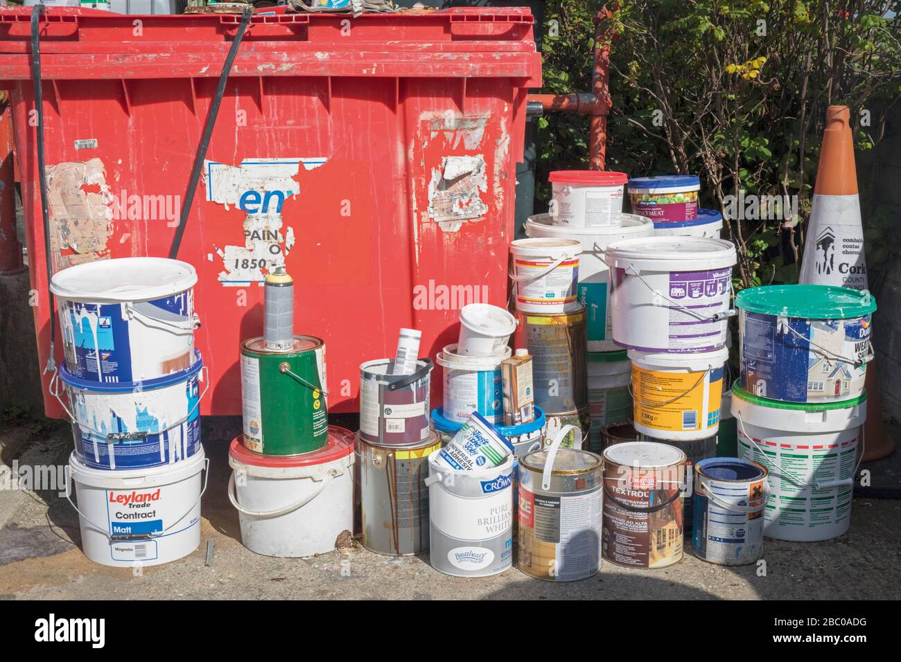 Recycled materials at collection point, Ireland.  Empty paint cans. Stock Photo
