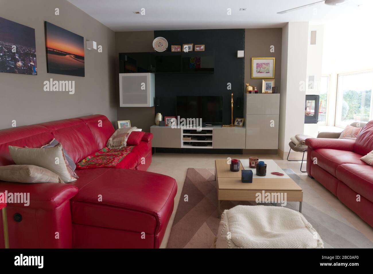 Living room with red sofa Stock Photo