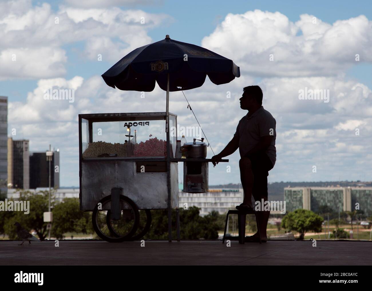 Silhouette of Street food vendor in Brazilia, Capital city of Brazil Stock Photo