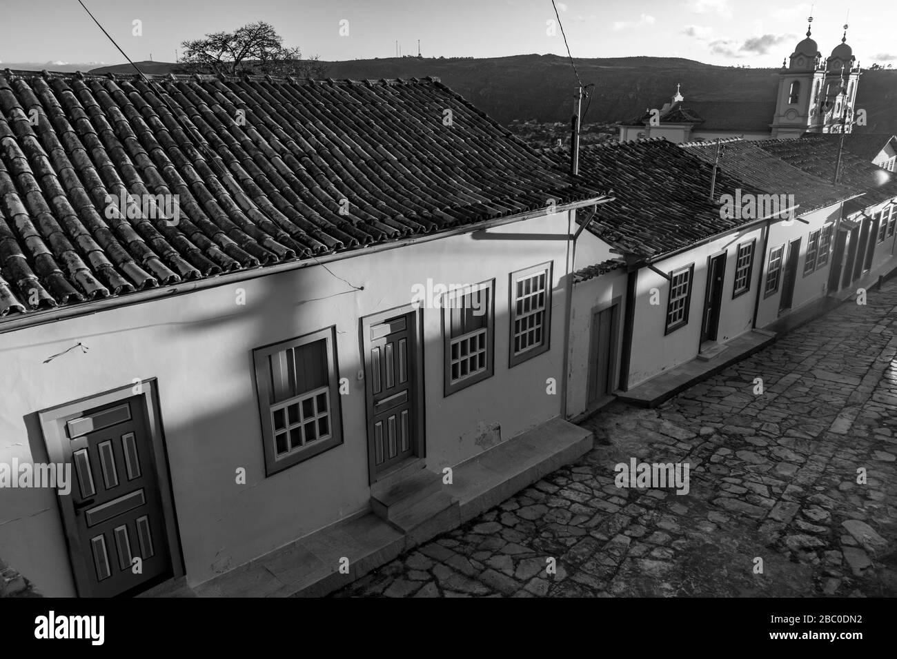 Old colonial houses and cobblestone street, in the historic city of Diamantina Stock Photo