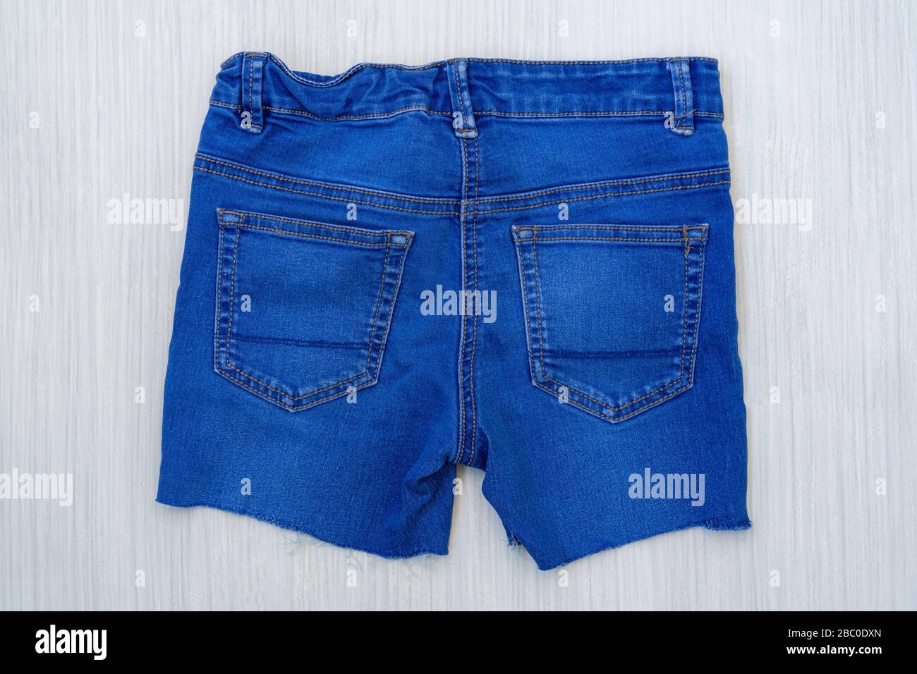 ripped shorts in the back