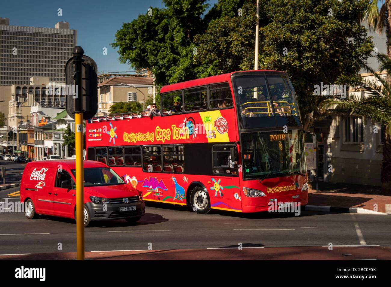 South Africa, Cape Town, Bree Street, Red City Sightseeing open topped hop on, hop, off, tour bus at road junction Stock Photo