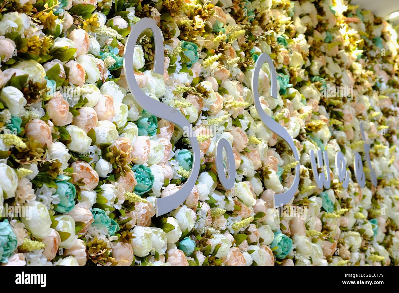 Floral shop display at Global Village, Dubai, UAE. Global Village combines cultures of 90 countries across the world in one place. Stock Photo