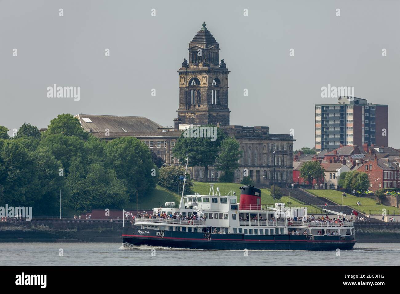 The Mersey Ferries Royal Iris of the Mersey passing Wallasey Town Hall on the Wirral Stock Photo