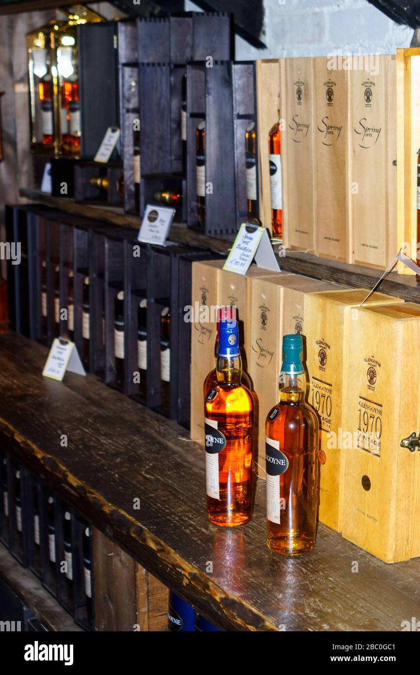 Single malt Whisky bottles at a shelf in a store Stock Photo