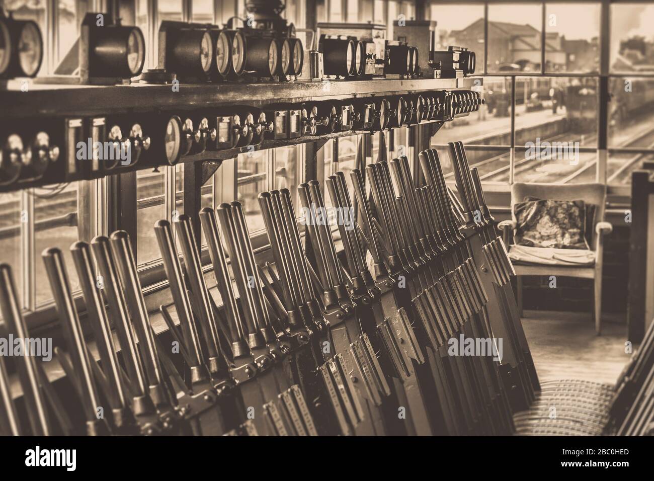 Sepia view of levers & equipment inside vintage signal box, Kidderminster station, Severn Valley Railway UK. Heritage railway UK. Stock Photo