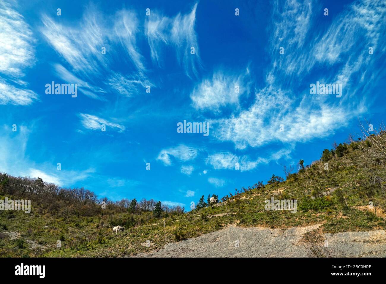 Blue sky and spectacular cirrus clouds over the Pyrenees at Ornolac, Ussat les Bains, Ariege, French Pyrenees, France Stock Photo