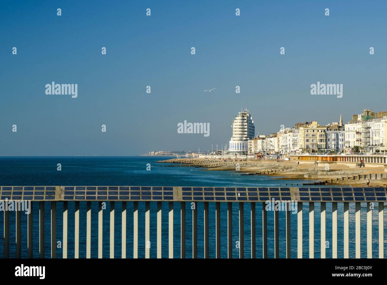 View of the coastline from the pier at Hastings, East Sussex, UK Stock Photo