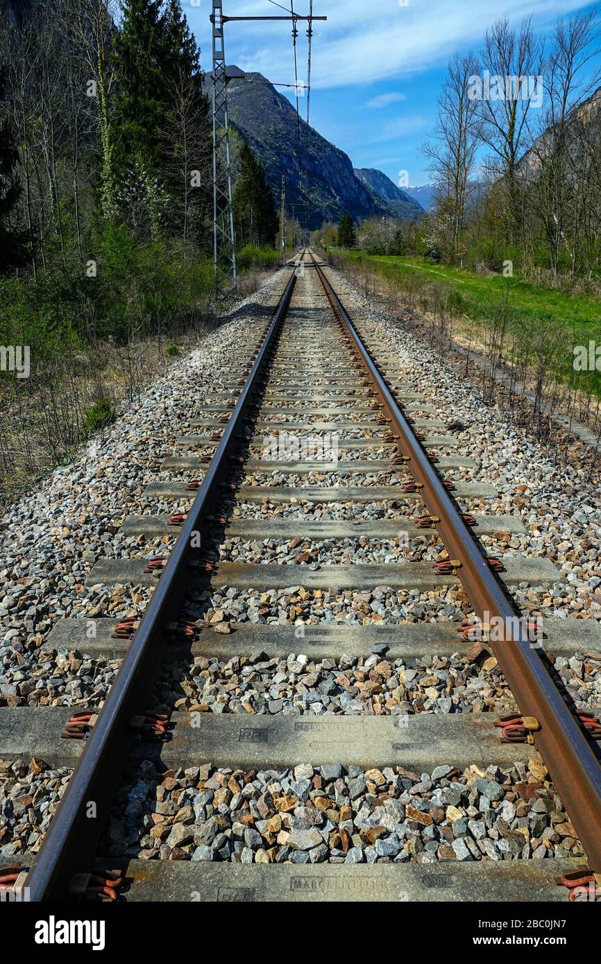 Railway lines disappearing into the distance, showing perspective and vanishing point Stock Photo