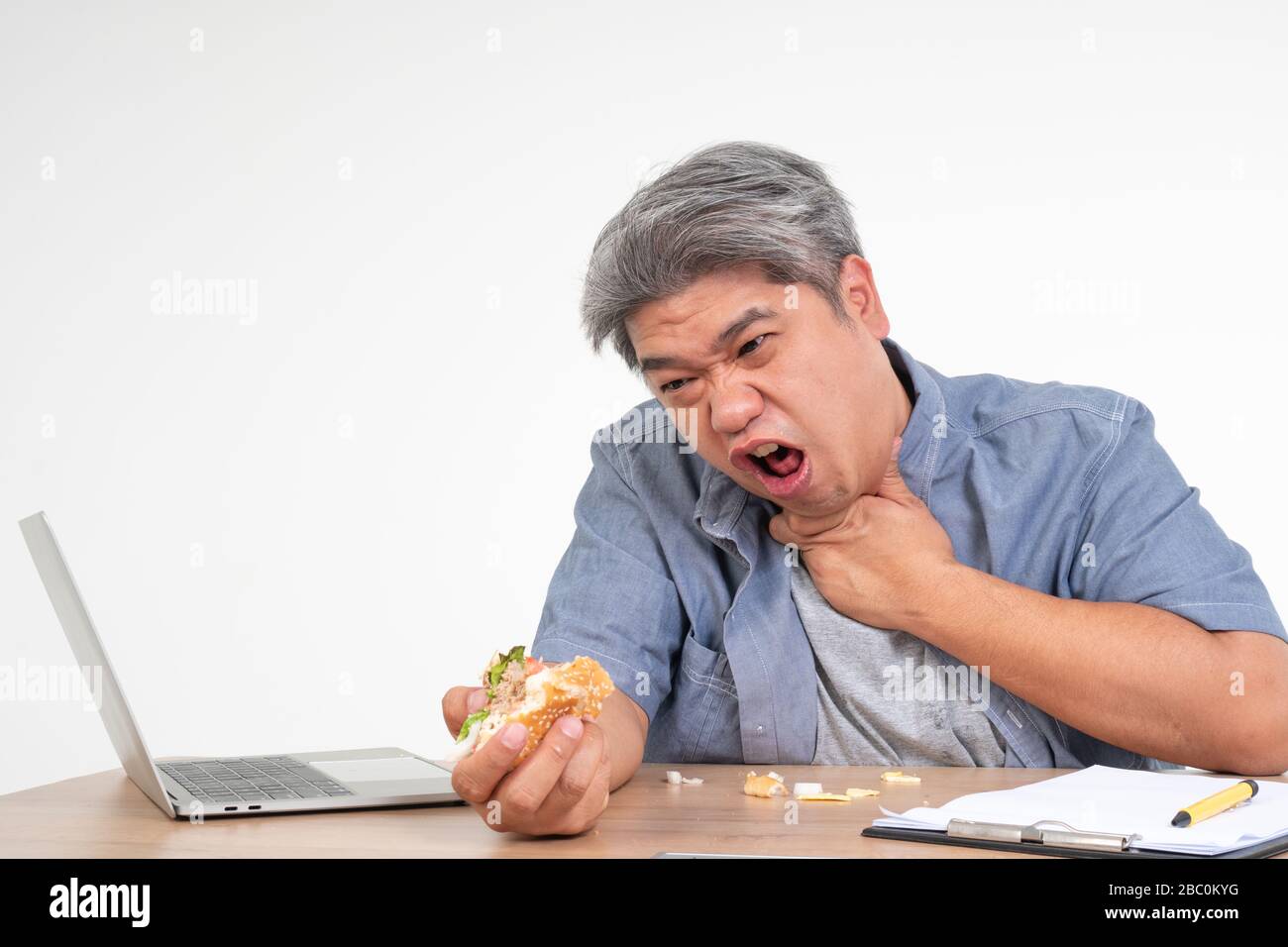 Choking with food hires stock photography and images Alamy