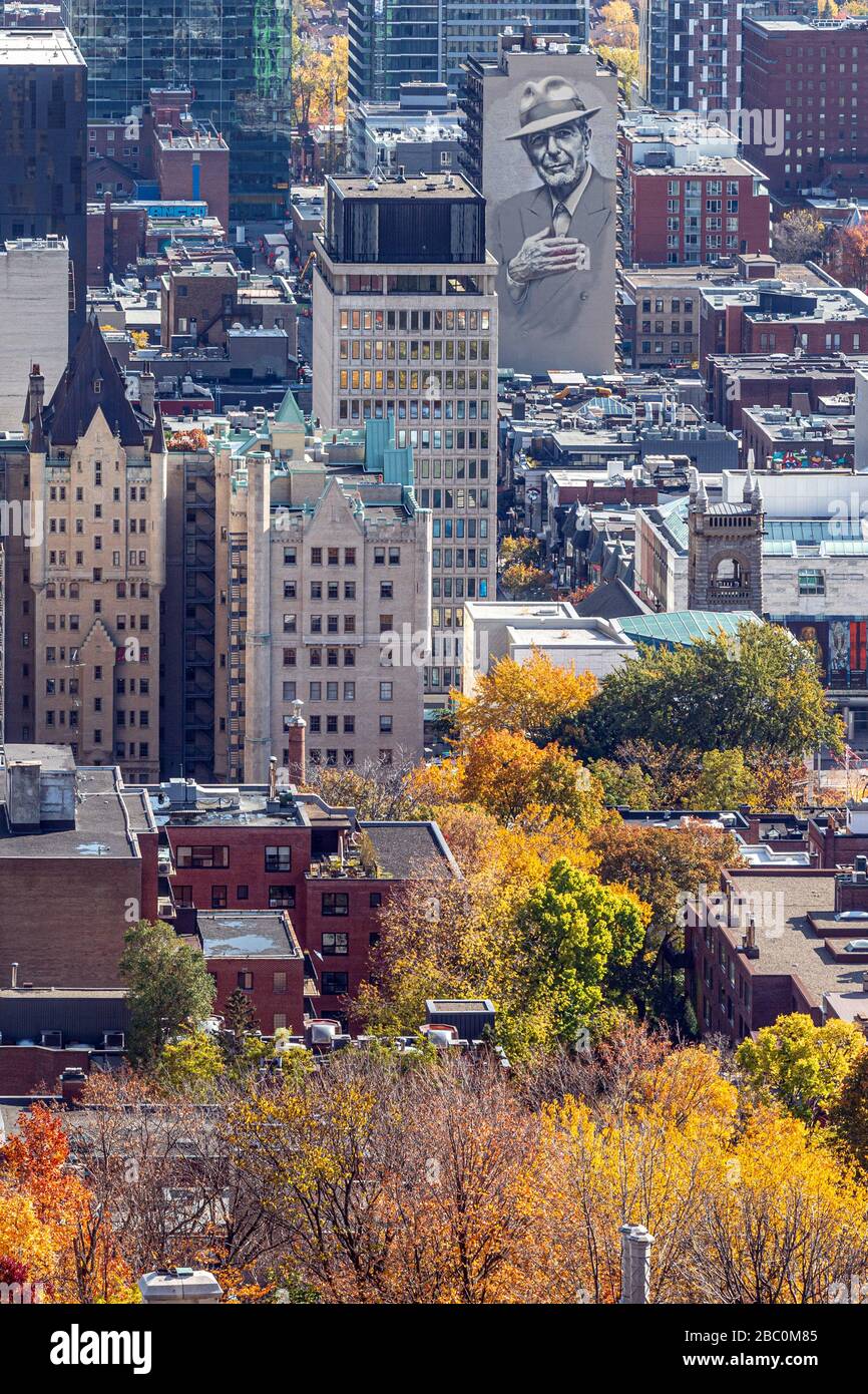 AUTUMN COLORS IN MONT-ROYAL PARK AND VIEW OF THE BUSINESS DISTRICT, MURAL OF LEONARD COHEN, CITY OF MONTREAL, QUEBEC, CANADA Stock Photo