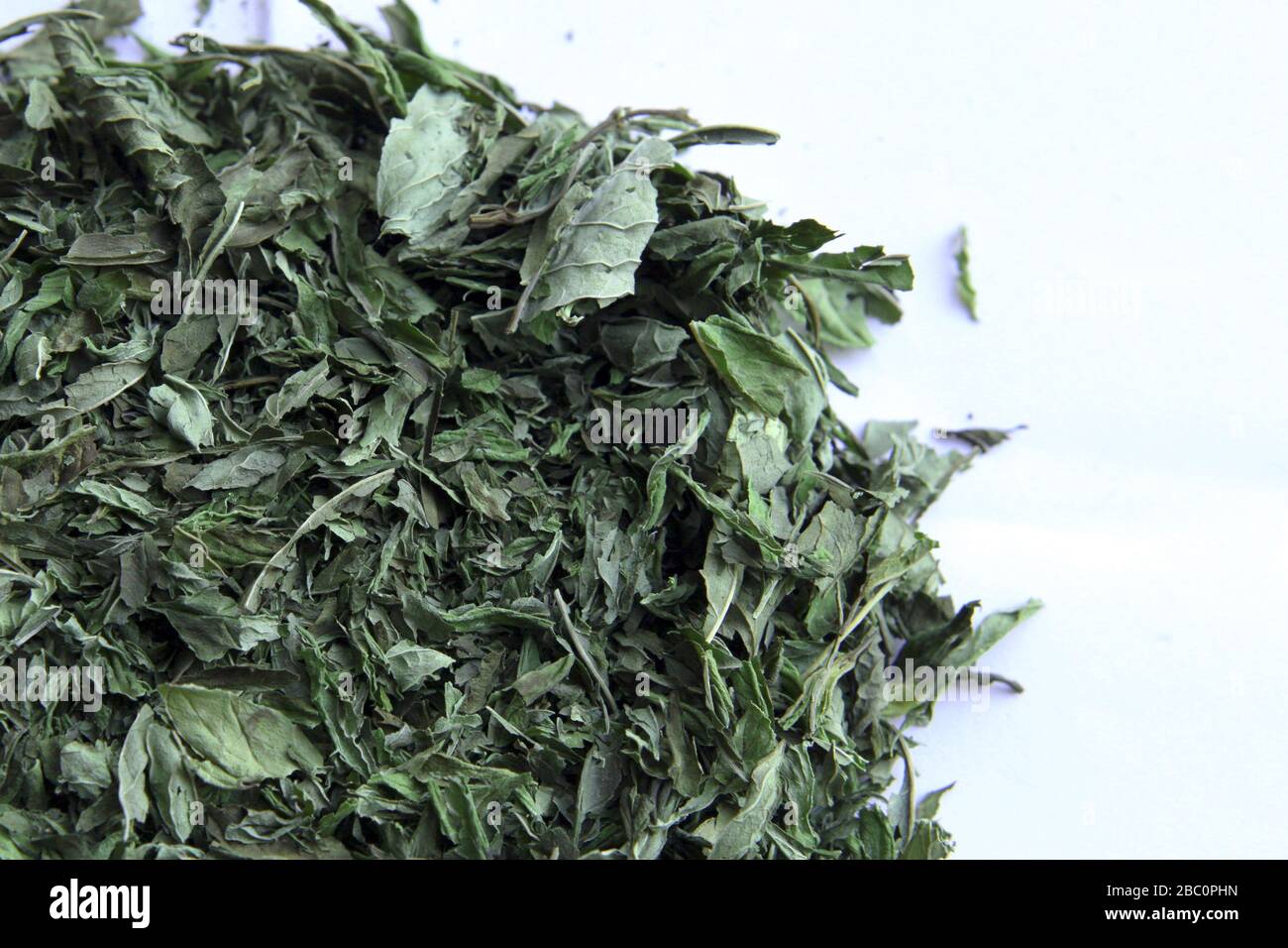peppermint tea leafs - dried peppermint on white Stock Photo