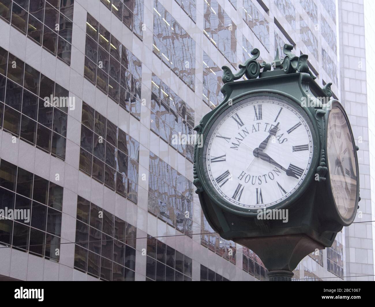 City Clock in Downtown Houston closeup on a foggy day Houston, Texas
