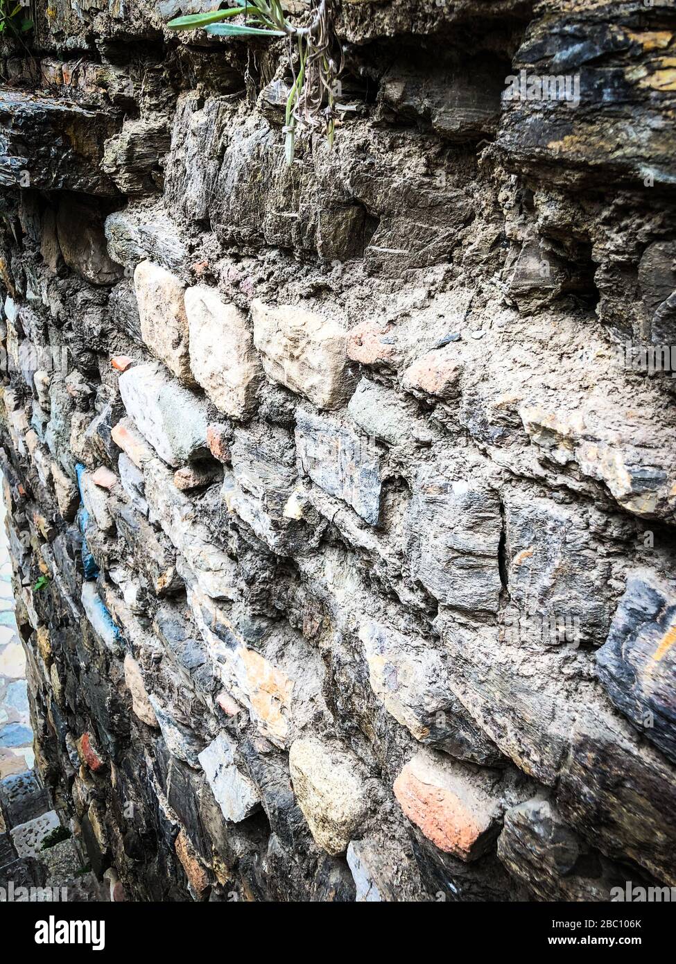 abstract wall close up view - stone, bricks, wood architecture of the ...