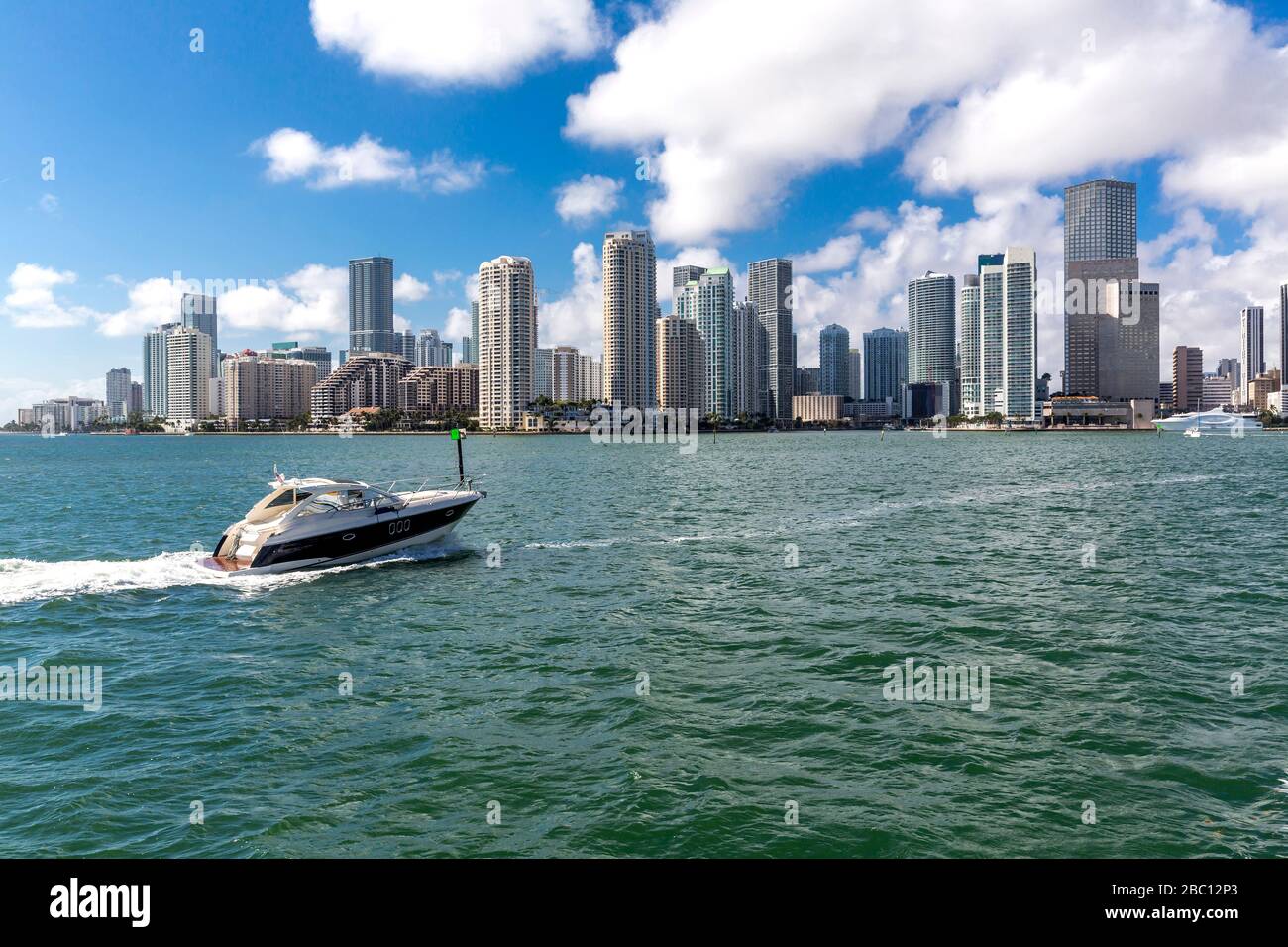 USA, Florida, skyline of Downtown Miami with motorboat on the water Stock Photo