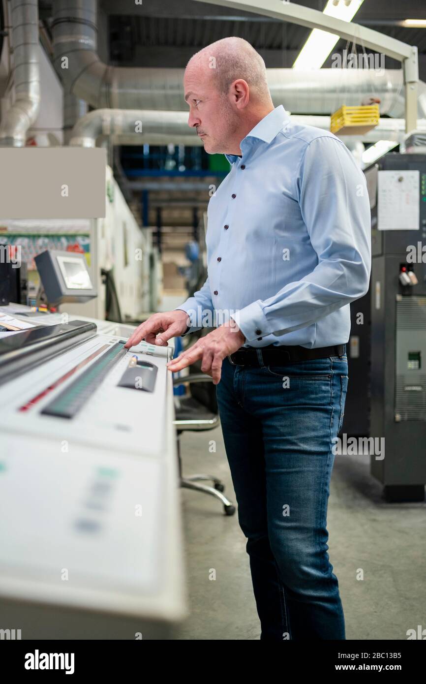 Engineer portrait man operating control hi-res stock photography and ...