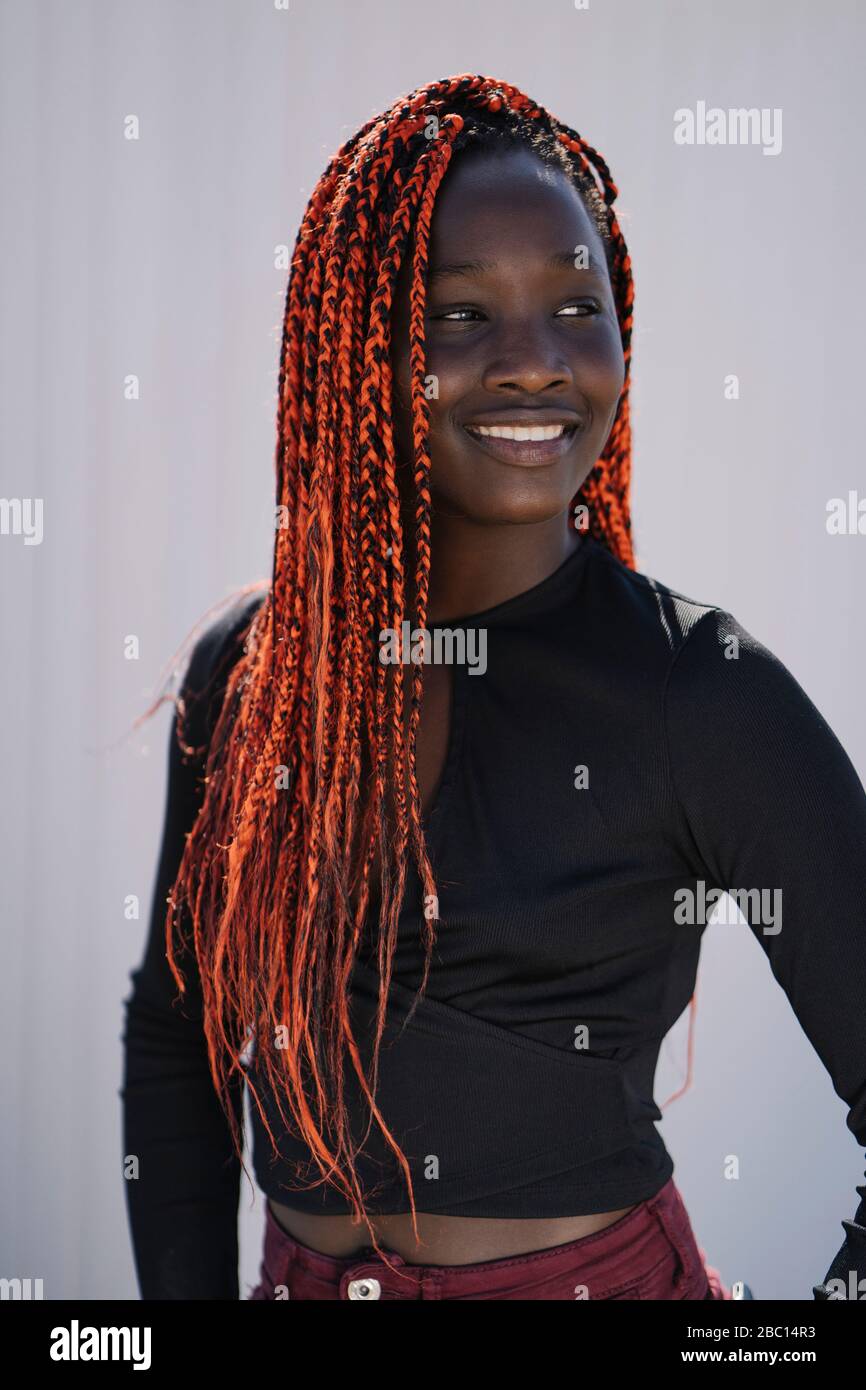 Black girl with long braids hi-res stock photography and images - Alamy