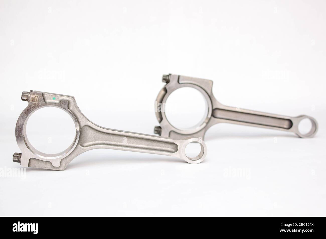 Connecting rod from a car engine isolated Stock Photo Alamy