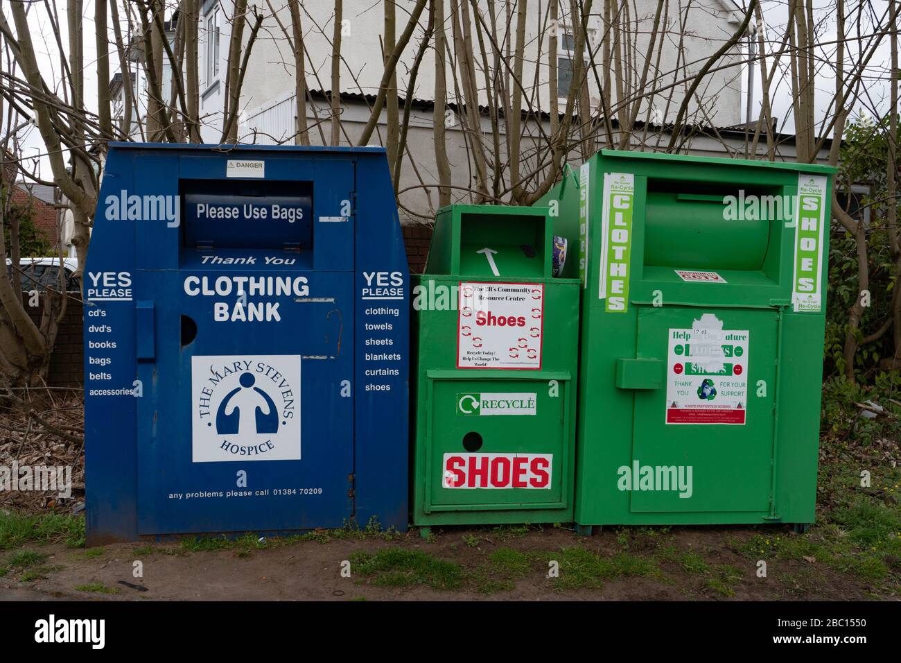 Clothing and shoe bank recycling bins hires stock photography and