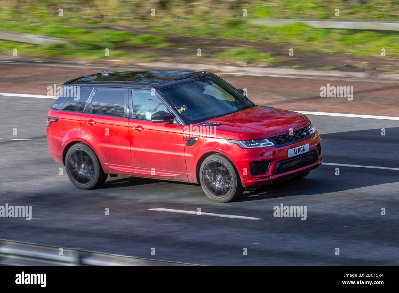 2018 red Land Rover Range Rover Sport HSE DYN SDV with private number plate, personalised, cherished, dateless, DVLA registration marks, registrations;; Vehicular traffic moving vehicles, driving British vehicle on UK roads, motors, motoring on the M6 motorway highway Stock Photo