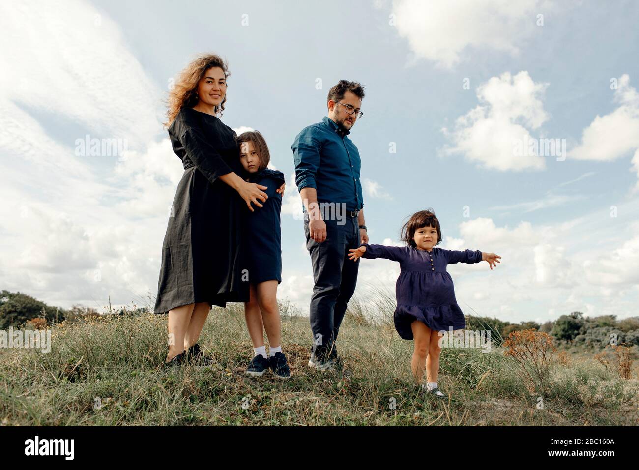 Family with two children spending time together in nature, The Hague, Netherlands Stock Photo